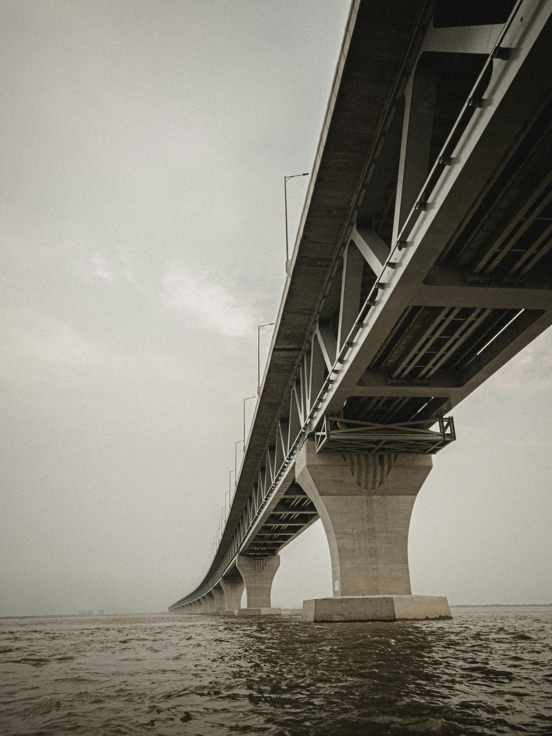 A striking view of a modern bridge in Munshiganj, Bangladesh, emphasizing architecture and engineering.